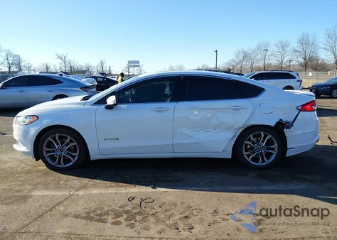 2017 Ford Fusion Hybrid Se z USA, uszkodzony, nr VIN 3FA6P0LU7HR285396